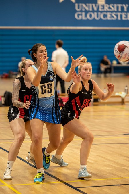 Hucclecote GK attempting to intercept a pass to the opposition GS