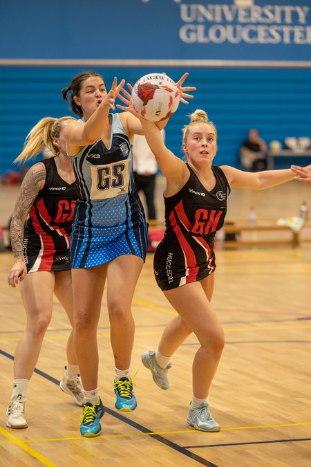 Hucclecote GK attempting to intercept a pass to the opposition GS