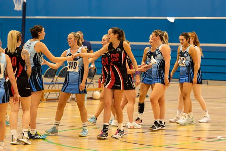 Hucclecote players shaking hands with the opposition at the end of a match