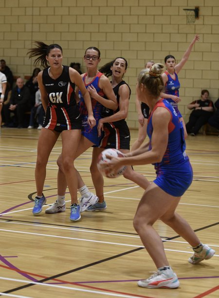 Hucclecote GK defending against Oldham